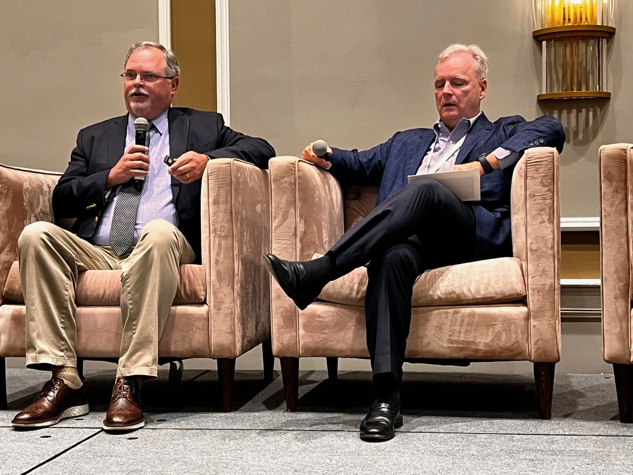 Ted Clem (left) and Greg Barker address the Economic Development Association of Alabama at the organization’s summer conference. (Michael Tomberlin / Alabama News Center)